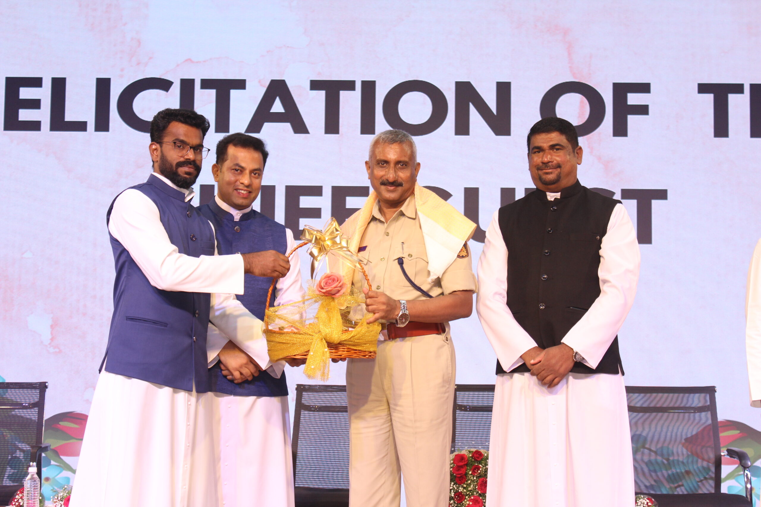 School dignitaries honoring Chief Guest Sri. C. E. Thimmaiah, Additional Superintendent of Police, Mandya District, Karnataka, during Investiture Ceremony 2026 at DPIRS.