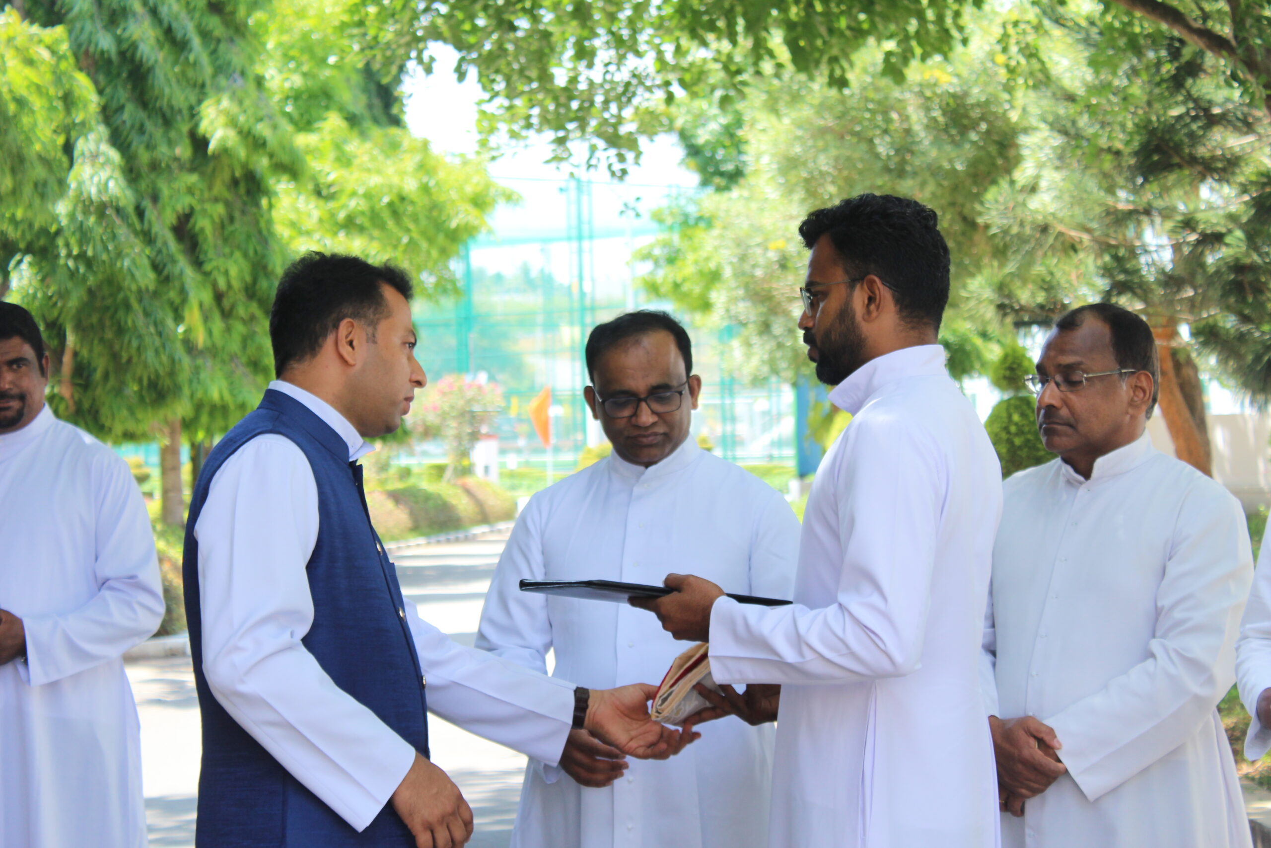 Students, staff, clergy, and management gathered during the blessing and inauguration of the new Grotto of St. Vincent de Paul at De Paul International Residential School.