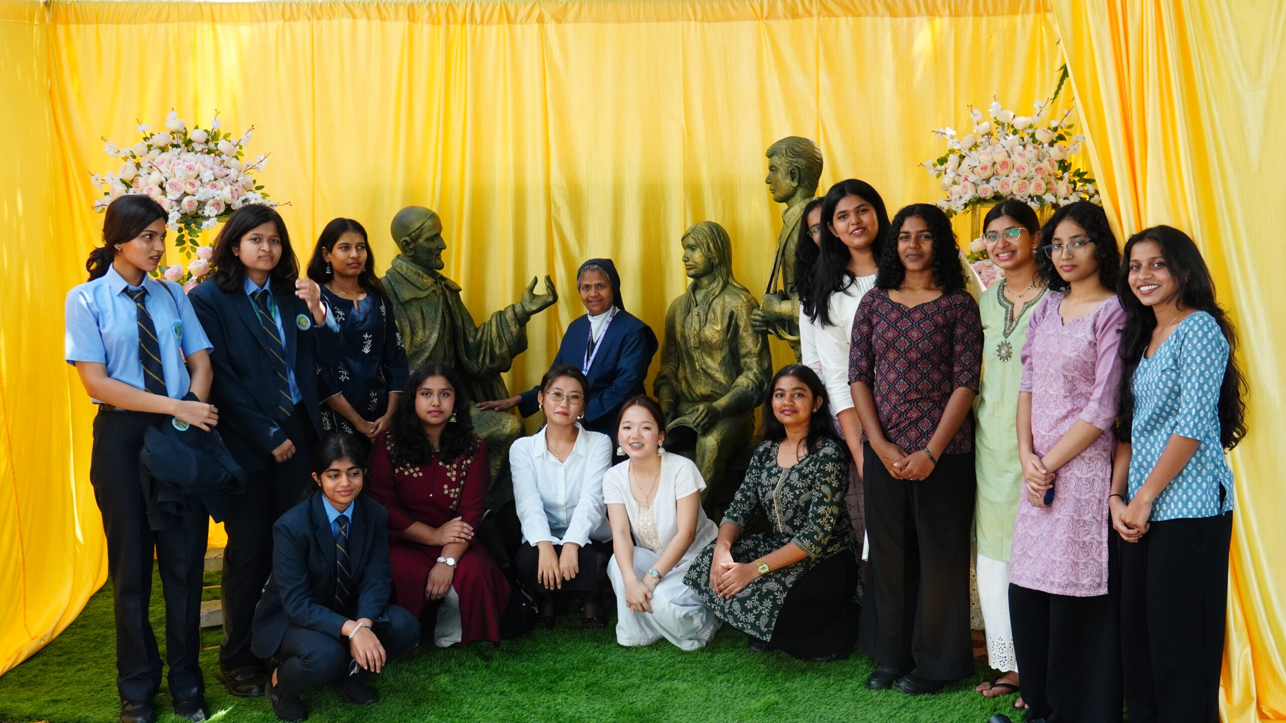 Students, staff, clergy, and management gathered during the blessing and inauguration of the new Grotto of St. Vincent de Paul at De Paul International Residential School.