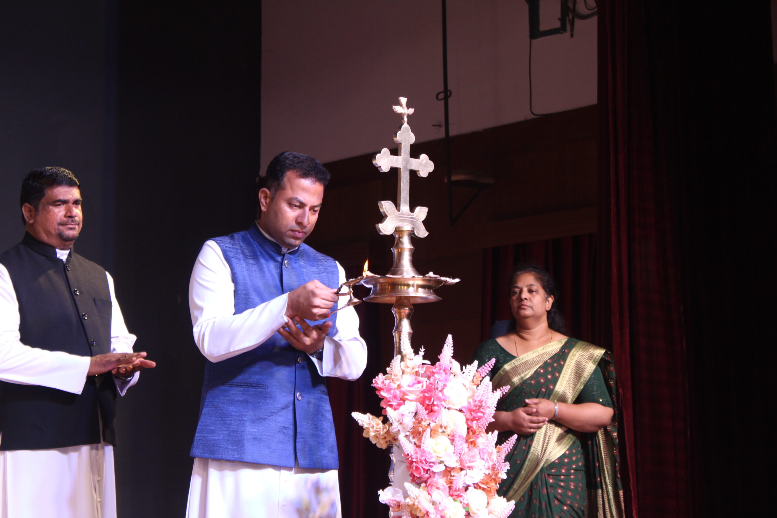 Students and staff performing during Novato Fiesta 2K25 Freshers' Day celebration at De Paul International Residential School, Mysuru.